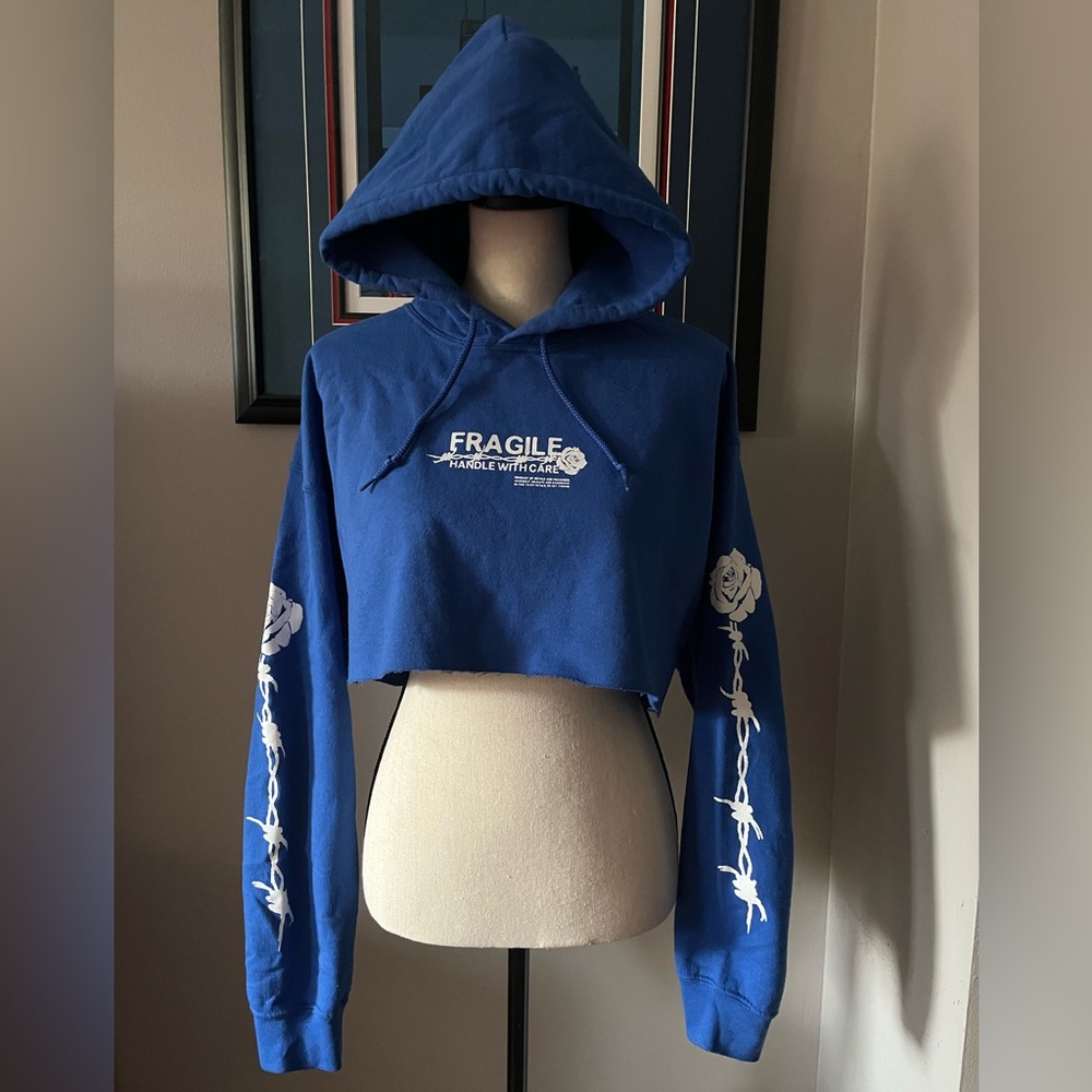 Petals and Peacocks Blue Cropped ‘Fragile’ Hoodie